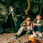 Two kids at a forest camp with a tent and drinks, enjoying nature. — Discover Inner Peace and Ocean Waves at Costa Rica's Sur