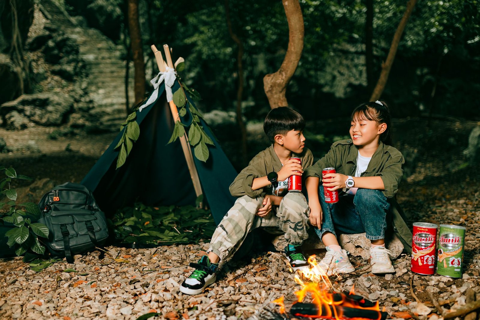 Two kids at a forest camp with a tent and drinks, enjoying nature. — Discover Inner Peace and Ocean Waves at Costa Rica's Sur