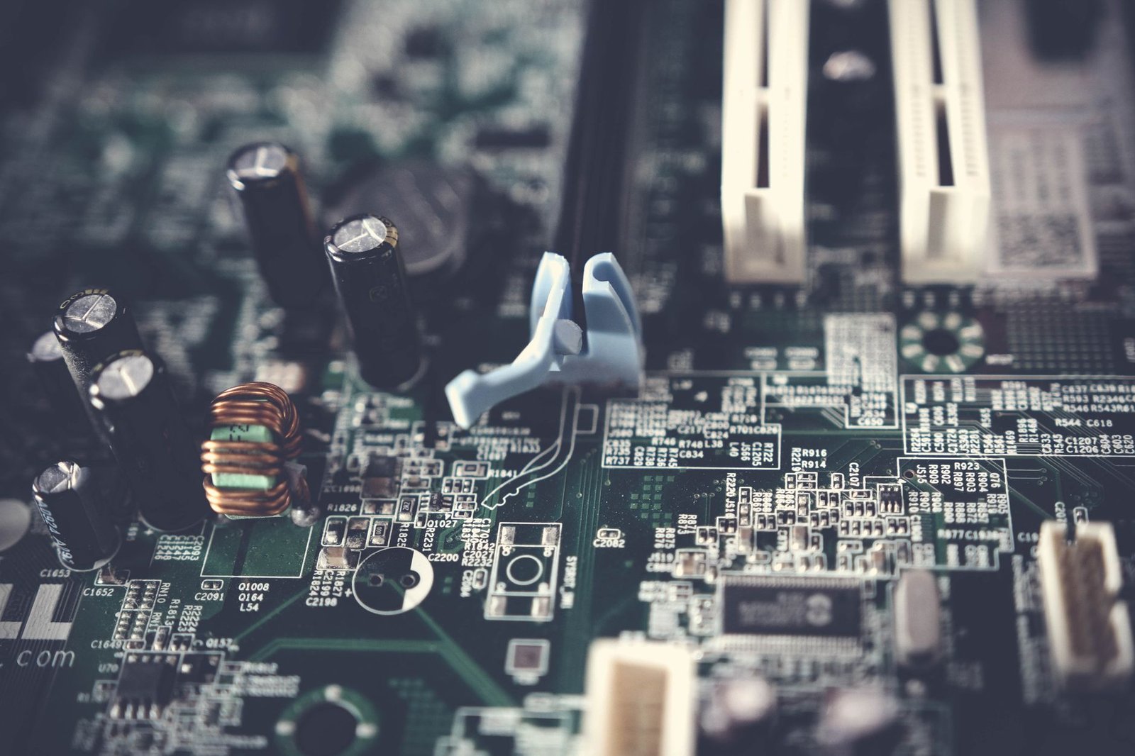 Detailed view of components on a computer motherboard, showcasing technology and circuitry. — Improving IT Governance with Ac